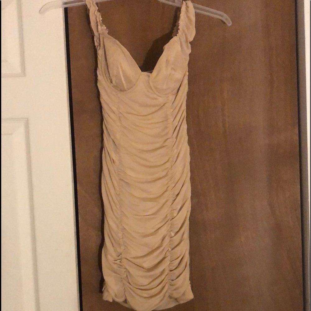 Hello everyone I am selling a cute cream dress from just Polly Size small.